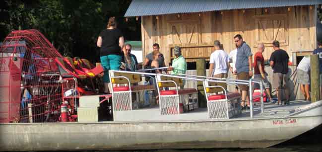 people on airboat swamp tour boat, airboat tours in spring