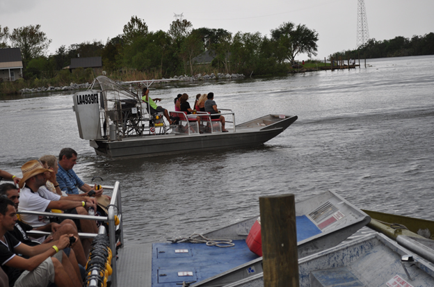 Groups on Two Airboats in Louisiana Swamp